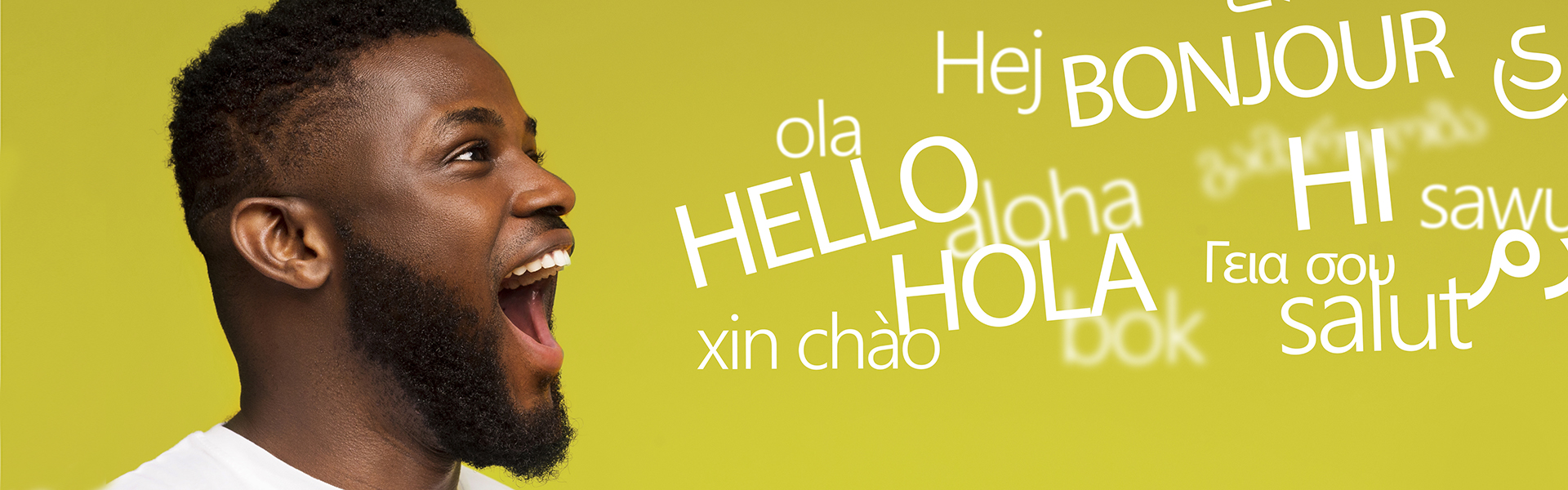 Mann beim Sprechen; das Wort "Hallo" in mehreren Sprachen visualisiert vor seinem Mund