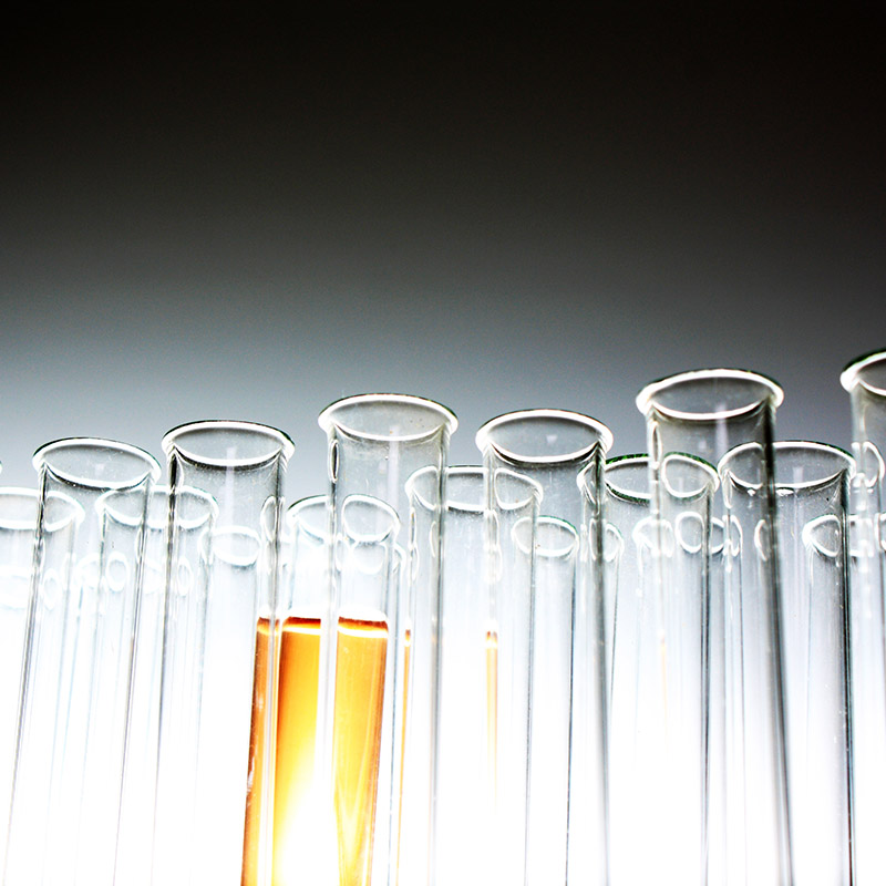 Goldenes Reagenzglas als Symbol für den Forscherpreis  